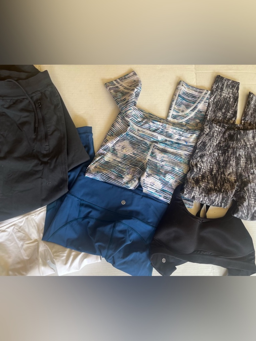 Reseller lot of mixed Lululemon leggings and bra. Mixed sizes